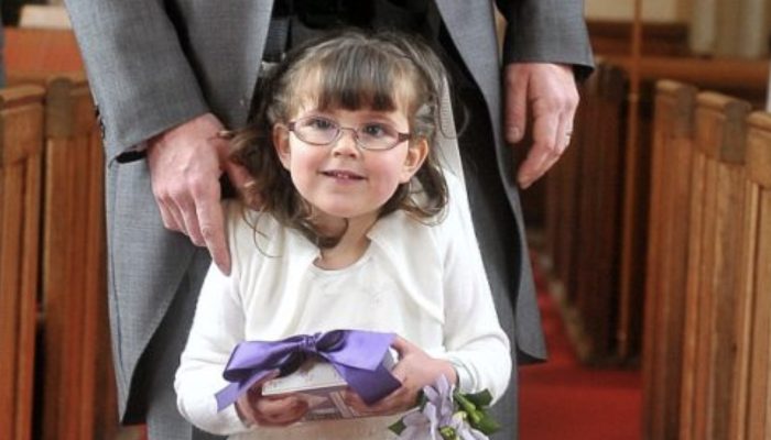 The little girl did her first steps-due to her own dad. Her dad had harness attached that helped the girl in her life.