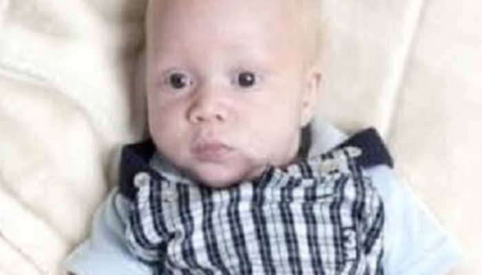 No one trusted its secret: black couple light haired, blue eyed child.