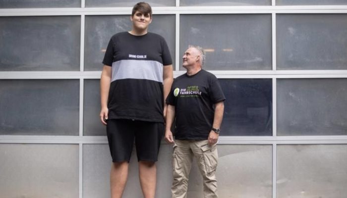 How is the 224-centimeter-tall boy? Who is 19 years of age? How is he doing?