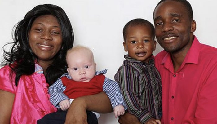 No one trusted its secret: black couple light haired, blue eyed child.