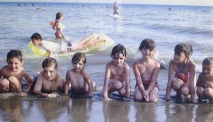 Years before they had met, a man discovered himself in the backdrop of a childhood picture of his fiancee.