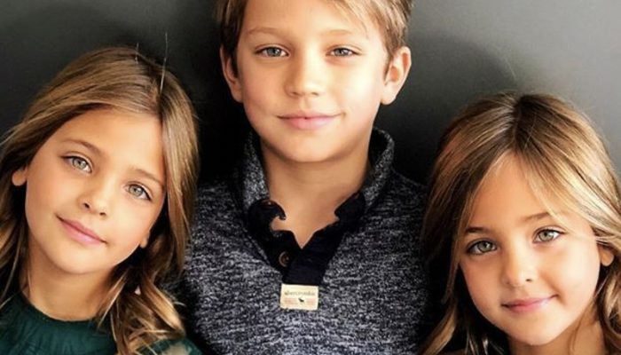 The girls are as beautiful as their dad. A photo of the dad of the most beautiful twins in the world.