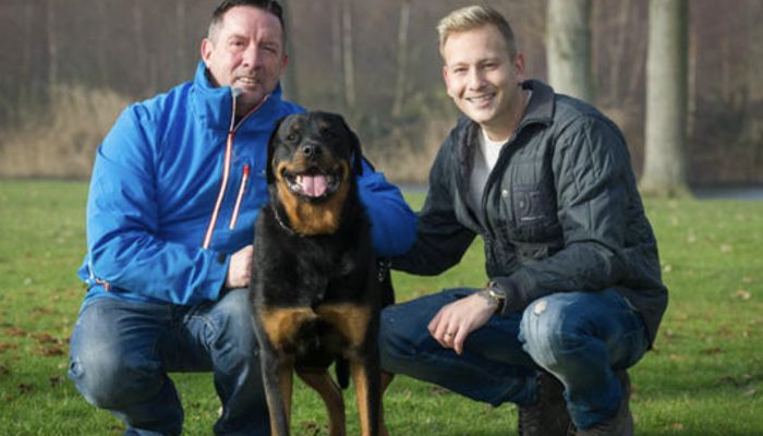 As the man lay unconscious, the Rottweiler unlocked the door for the paramedics, saving his life.