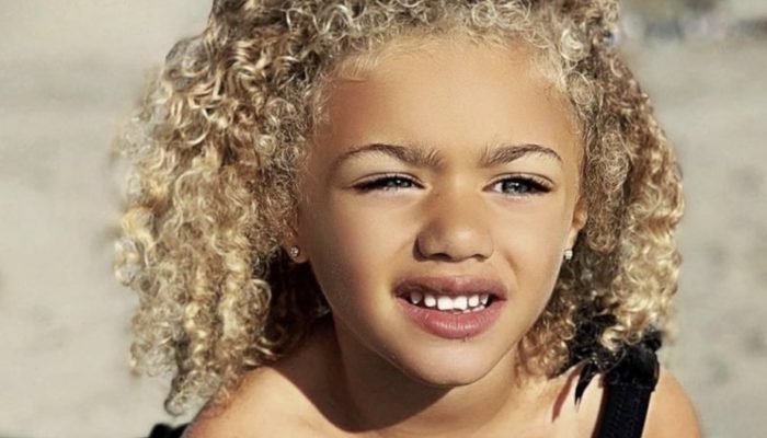 A blue-eyed five-year-old child is bathing the world with beauty. Amazing to see.