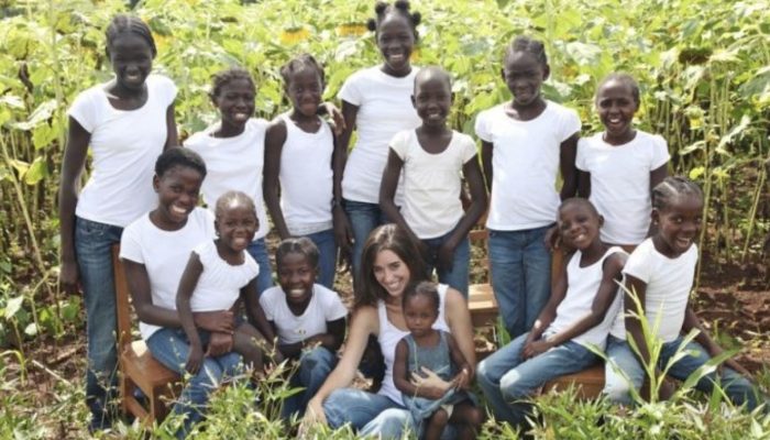 A young woman adopts and takes home a brood of thirteen kids to raise as his own before getting married.