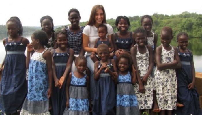 A young woman adopts and takes home a brood of thirteen kids to raise as his own before getting married.