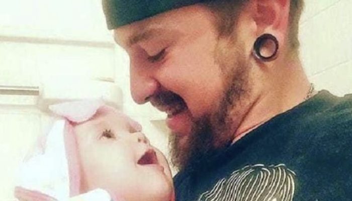 He became the world's best father after the wife left him to care for the newborn daughter alone.