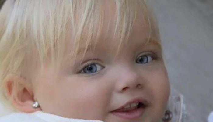 What is the current appearance of the girl who was thought to be a doll when she was younger?