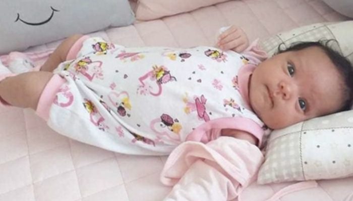Newborn recognized her father's voice as soon as she heard it and greeted him with a bright smile.
