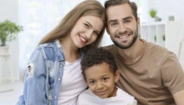 A Slavic couple adopted a young boy 15 years ago; their lives would be depressing without him.