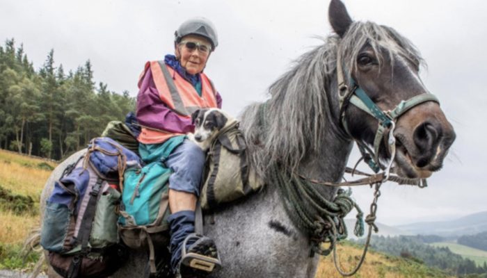 An 80-year-old woman travels approximately 1,000 kilometers on horseback each year with her disabled dog.