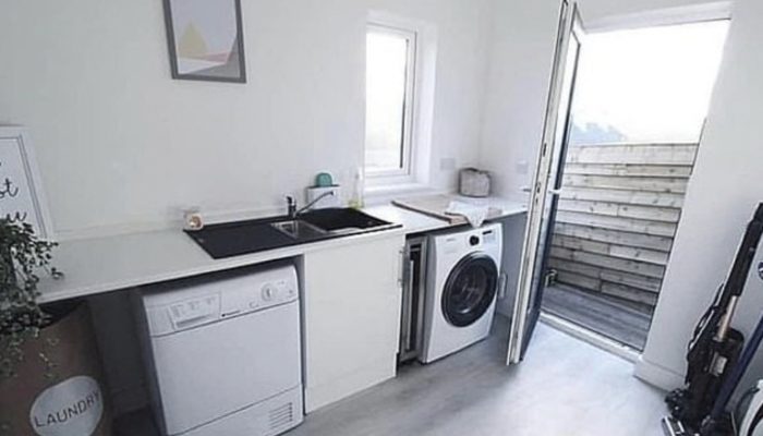 A family transformed a junk-filled house into a super-apartment over the period of two years of work.