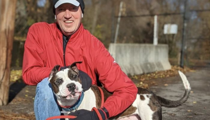 On his 50th birthday this volunteer walks 50 dogs and raises money for a shelter.