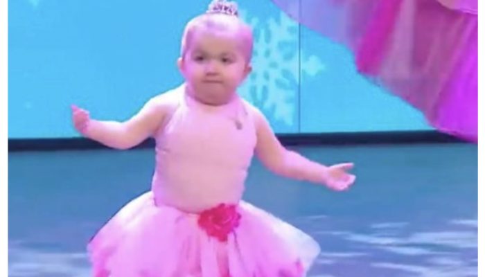 A young bright girl suffering from an incredibly unusual illness participates in the ballet performance.