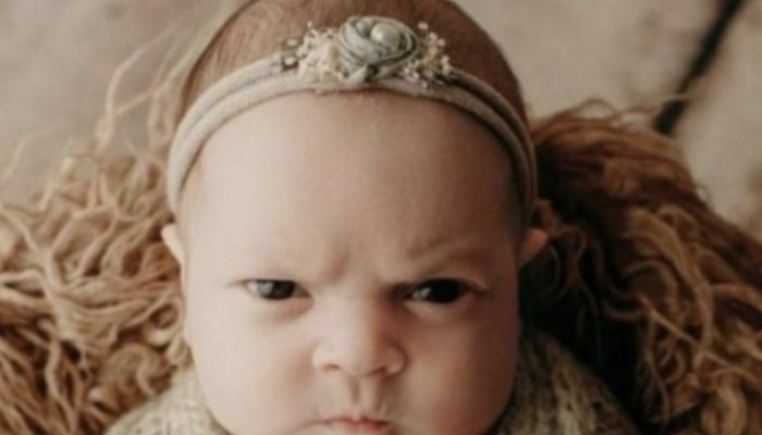 A 14-day-old girl's talking eyes and facial expressions are used to express her unhappiness.