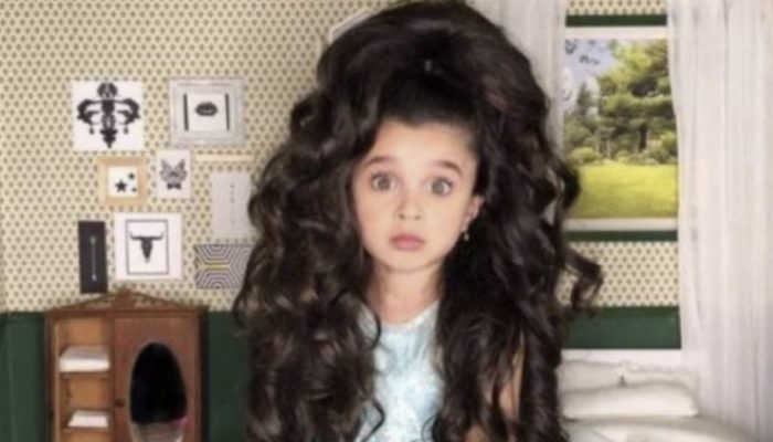 Pictures of the young girl became popular on the Internet because of her stunningly long hair.