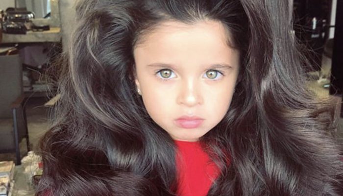 No one can believe that a 7-year-old girl's luxurious long hair is natural as she represents social media.