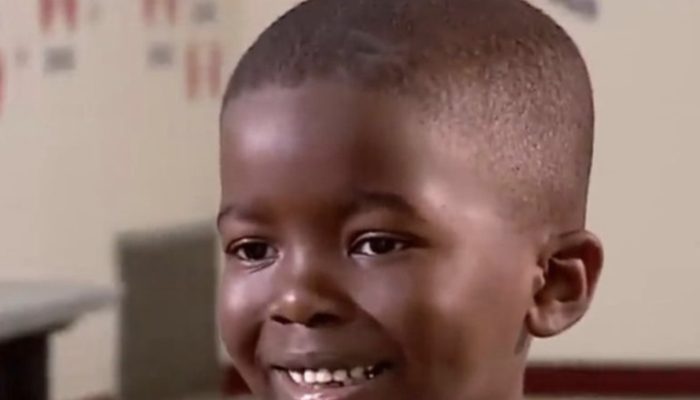 On the first day of school, a lovely first-grader dances joyfully.