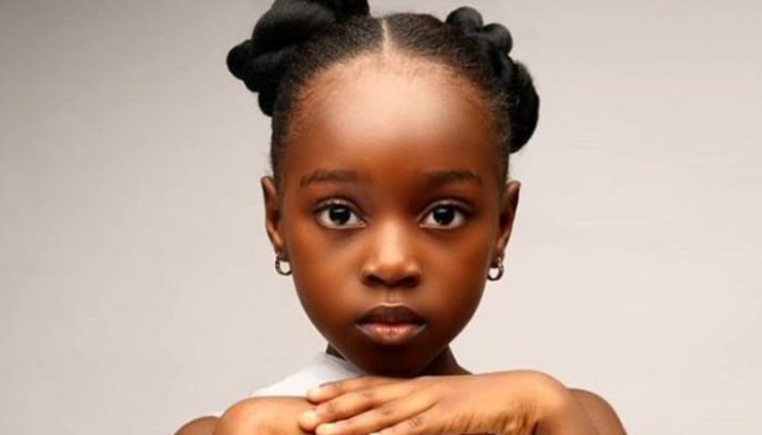 Pictures show a young Nigerian girl, aged 5, who has apparently been solicited for modeling jobs