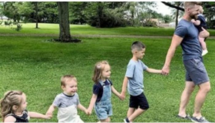 The mom finds she is expecting quadruplets just two months after adopting four children
