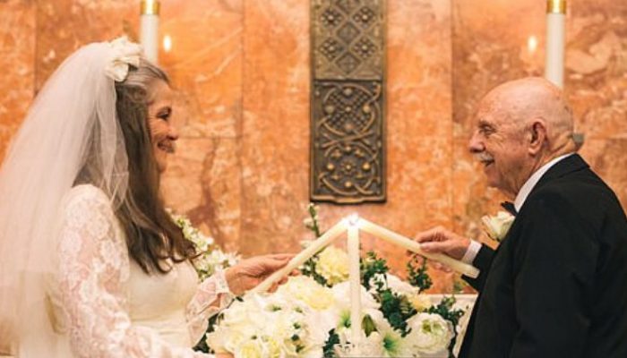 As a way to celebrate their anniversary, the elderly couple reenacts their wedding picture shoot in the same church where they exchanged vows